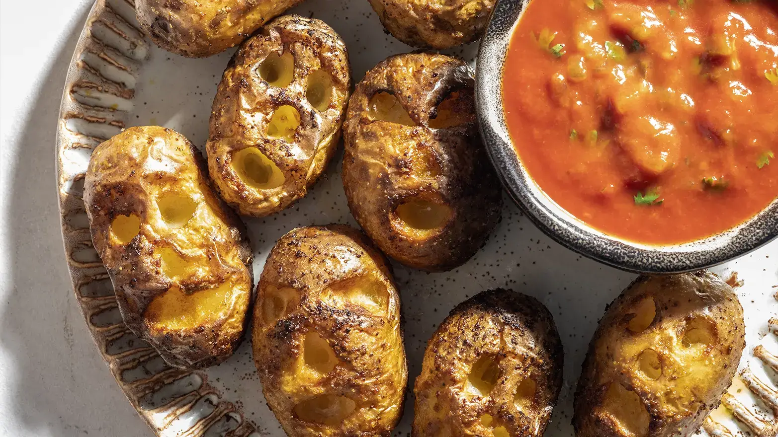 Baked potatoes carved to resemble shrunken heads