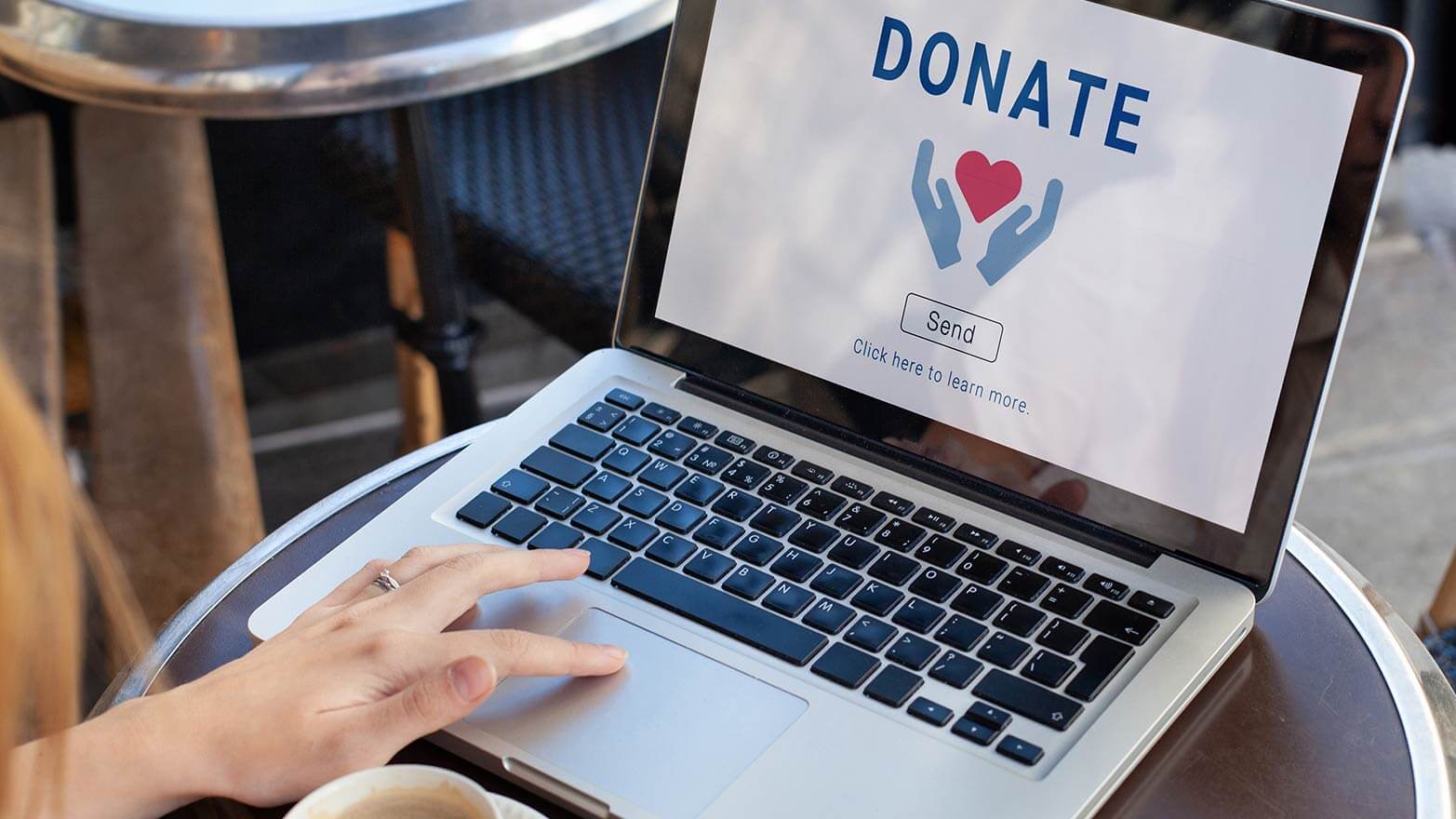 A person donating to a charity online