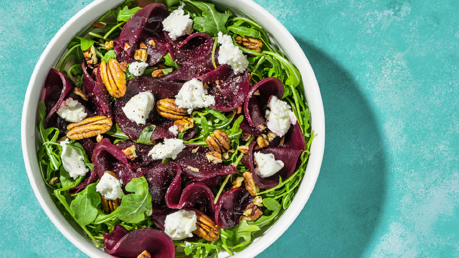 Roasted beet and arugula salad with candied pecans
