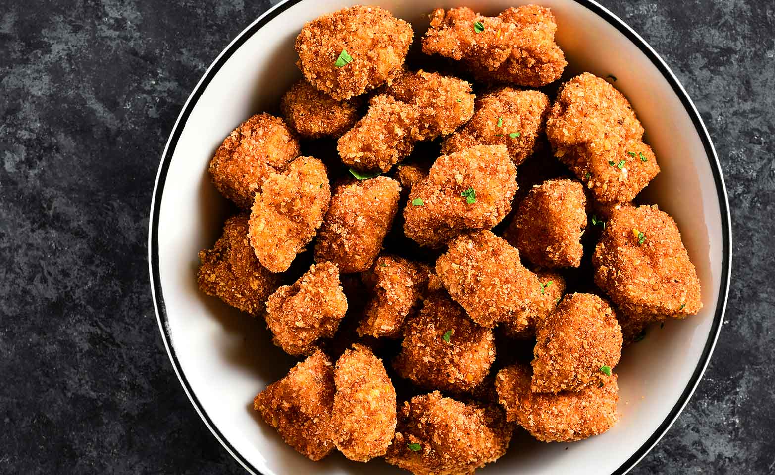 Stock image of crispy popcorn chicken bites