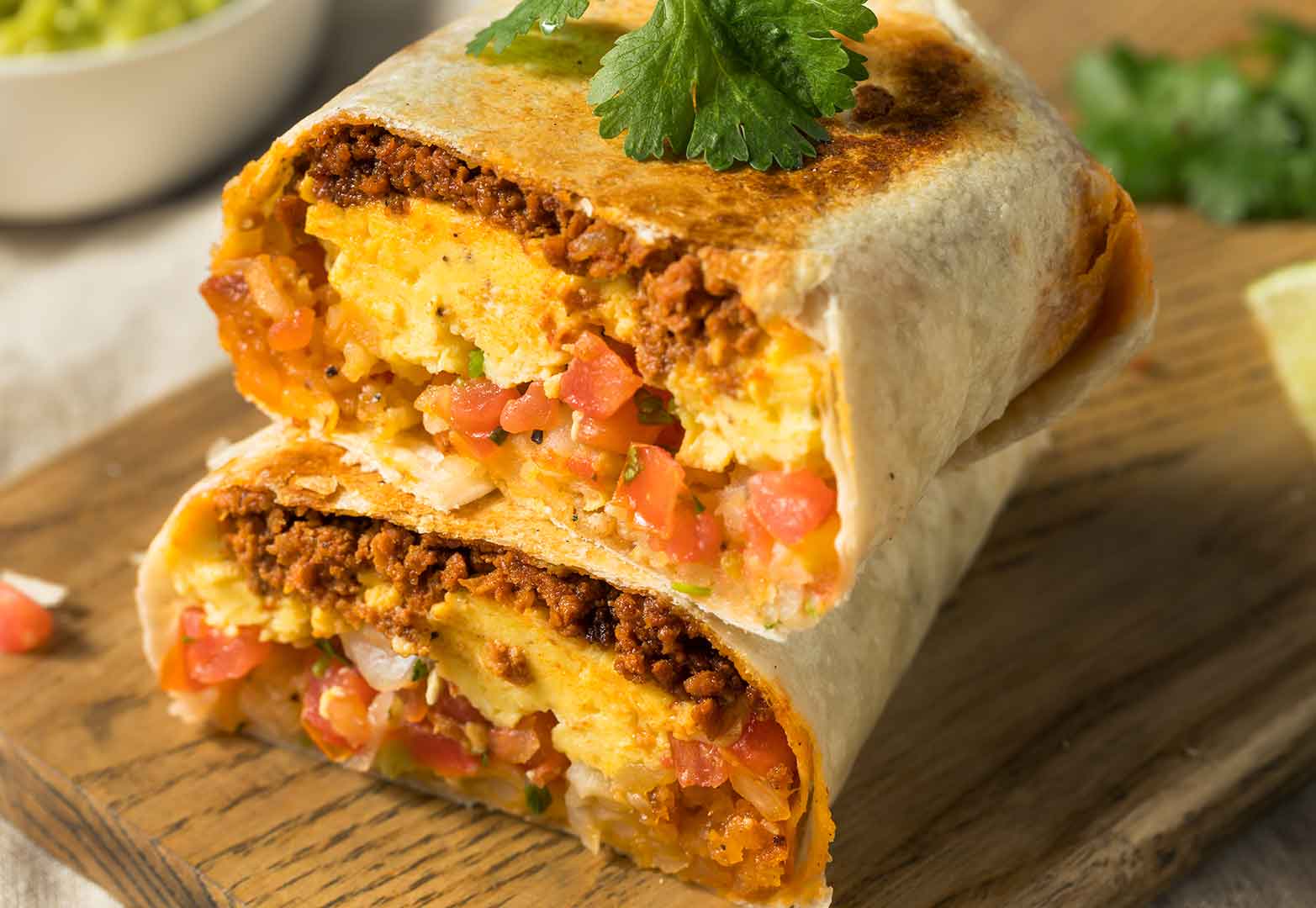 Mexican chorizo breakfast burrito with salsa