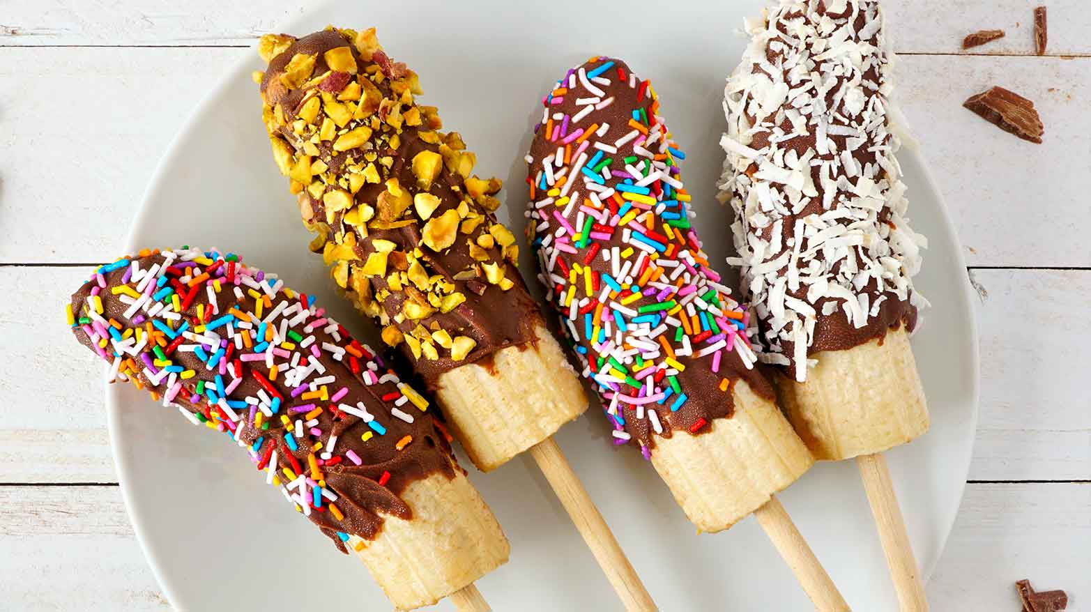 Making frozen banana pops with kids.