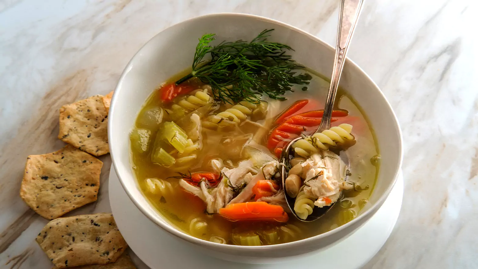 A bowl of rotisserie chicken soup.