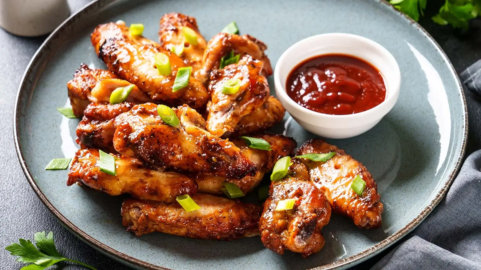 Grilled chicken wings with barbecue sauce