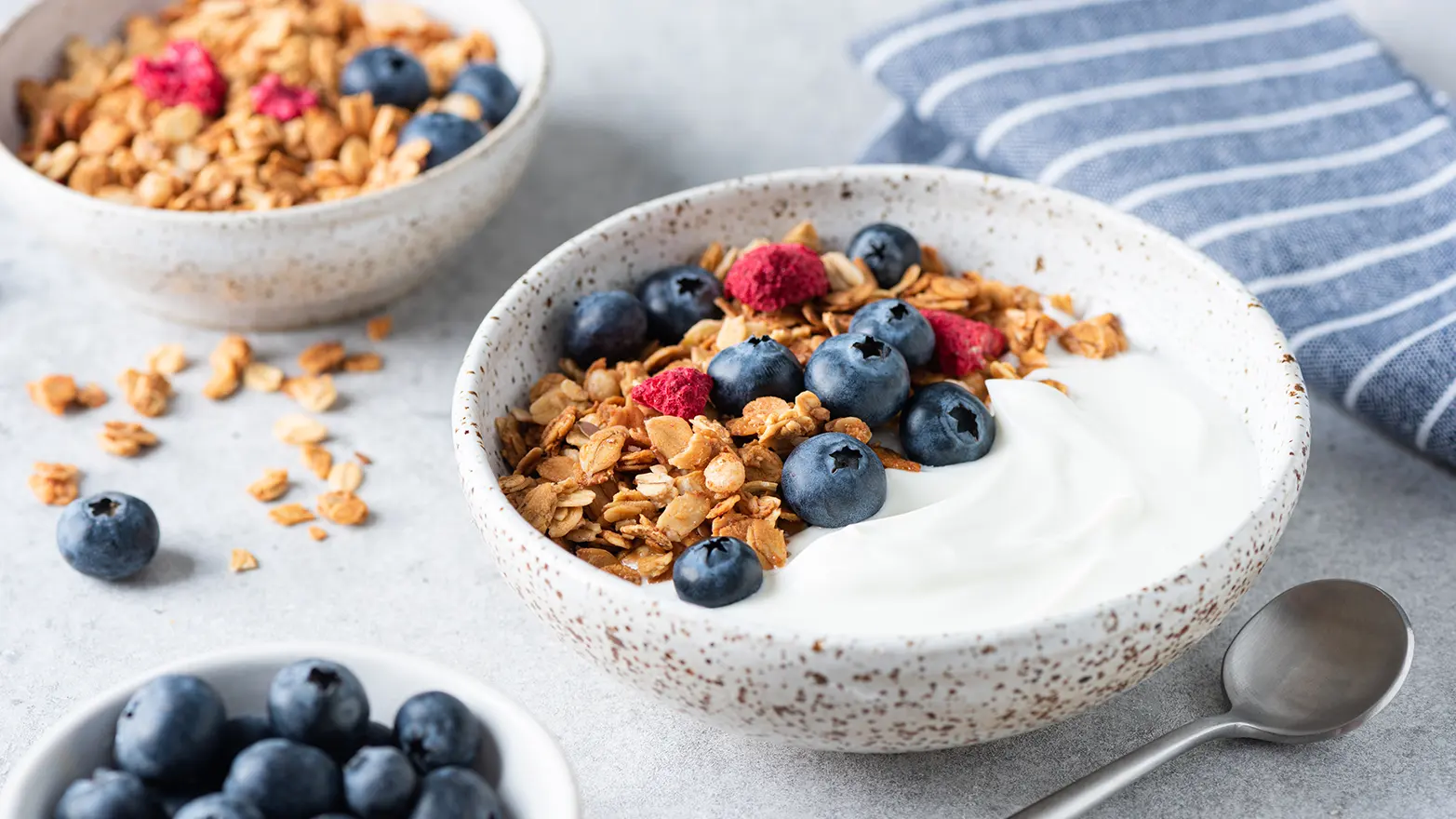 Photo of yogurt and granola fruit smoothie bowl