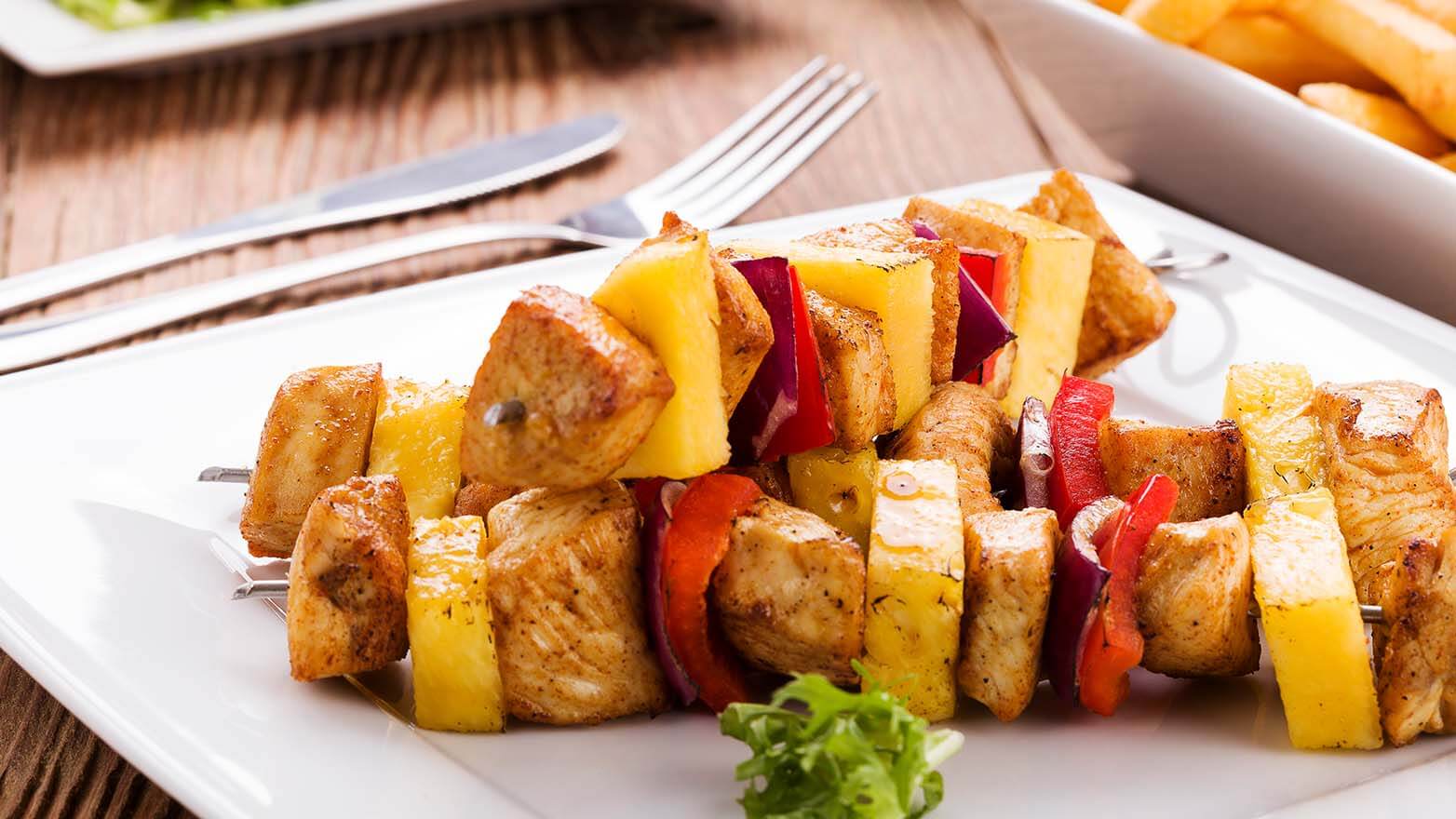 Pineapple glazed chicken skewers
