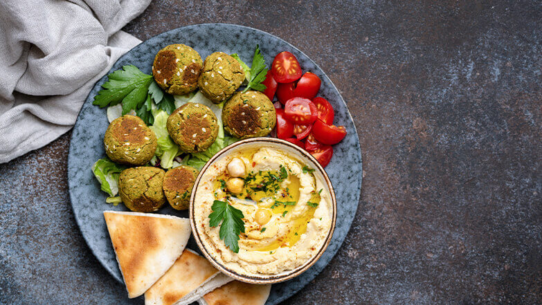 Combine two greek classics with falafel and hummus.