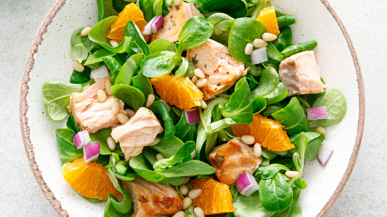 a photo of honey glazed salmon with citrus salsa