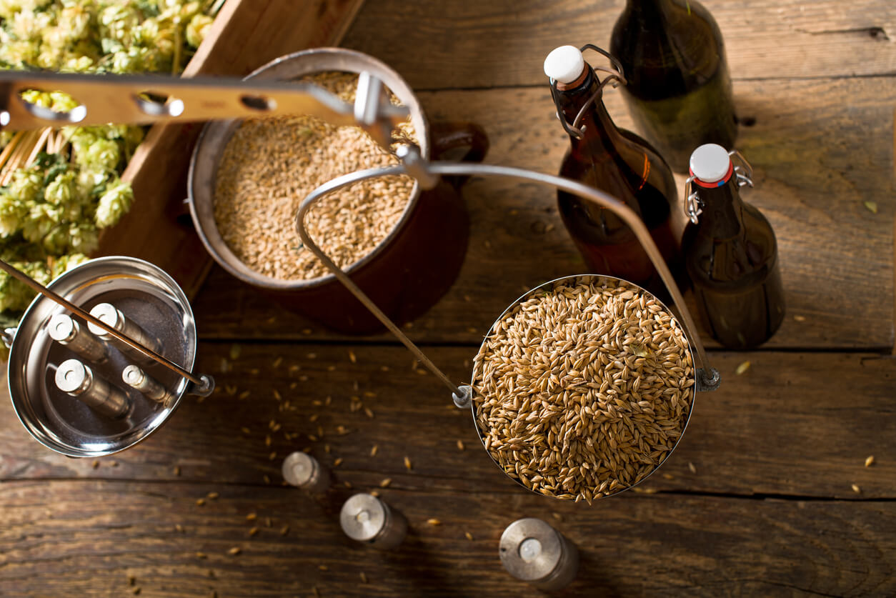 Man Weighs Malt for Home Brewing of Beer.