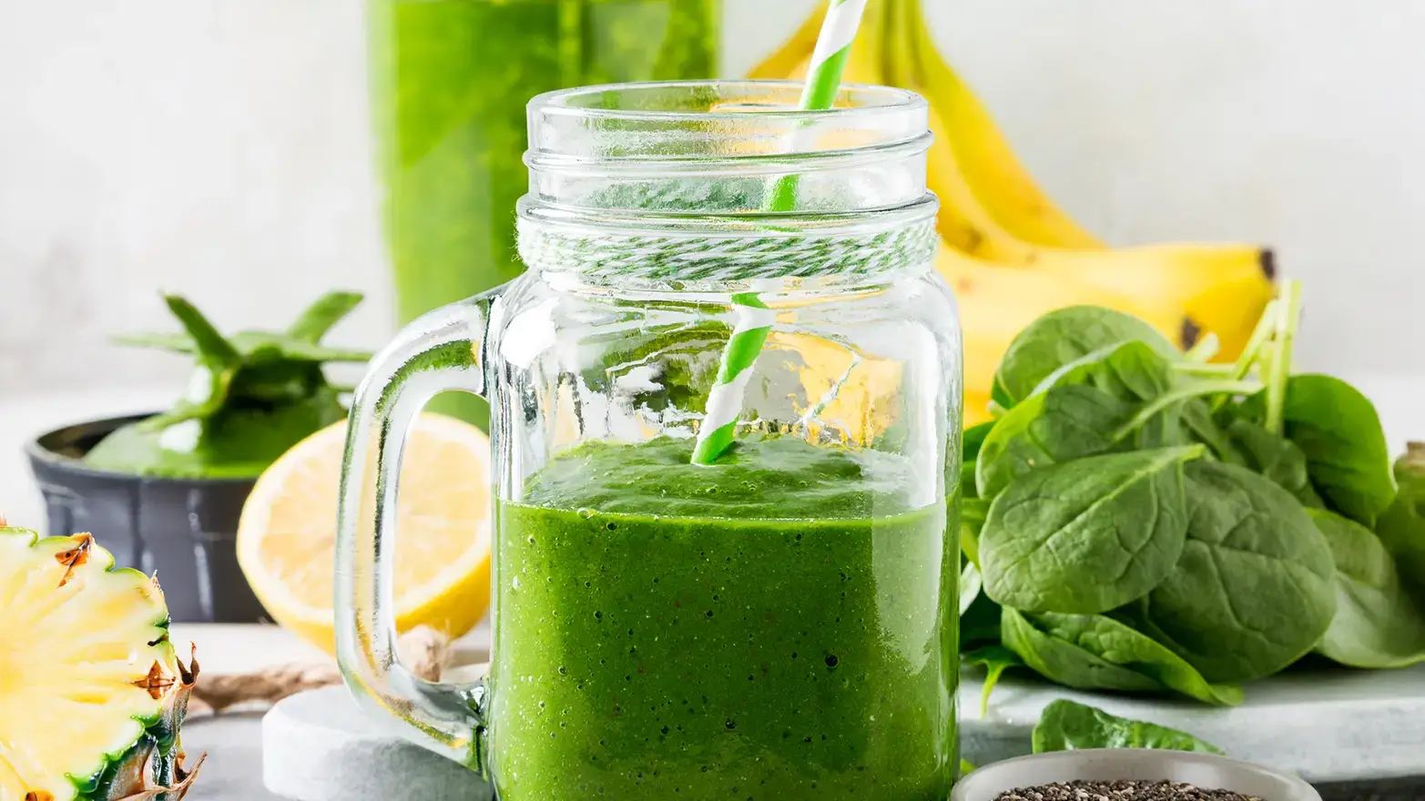 Photo of green smoothie with banana and pineapple