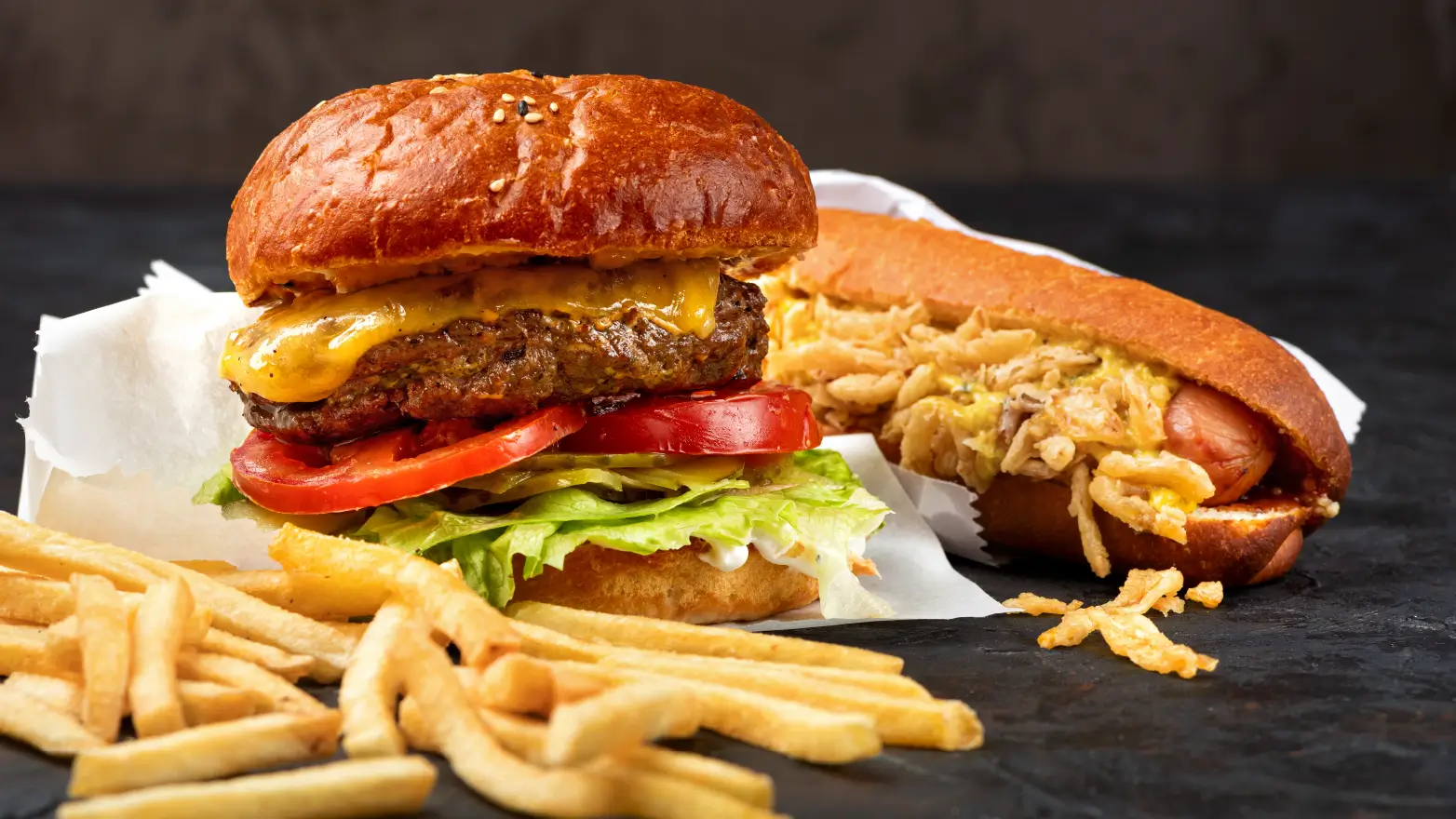 Hamburgers and hot dogs with fries