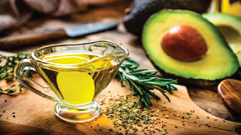 glass gravy boat with avocado oil