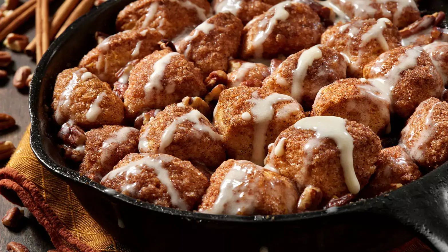 Cinnamon roll monkey bread in a cast iron pan