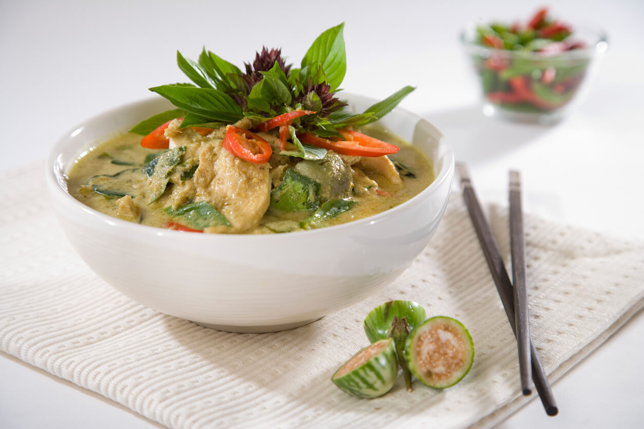 With Chicken In A Modern White Bowl.