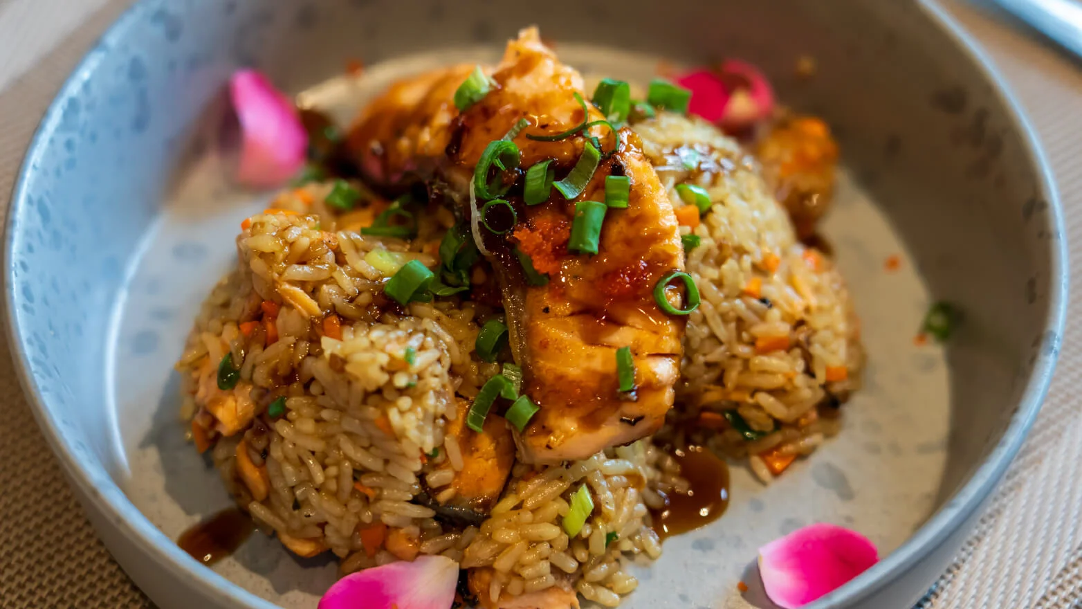 a photo of teriyaki glazed salmon with pineapple fried rice