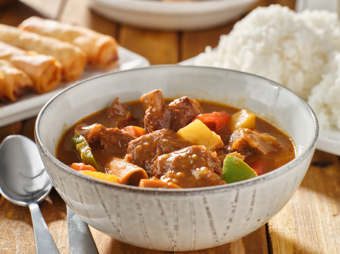 filipino beef kaldereta in bowl close up