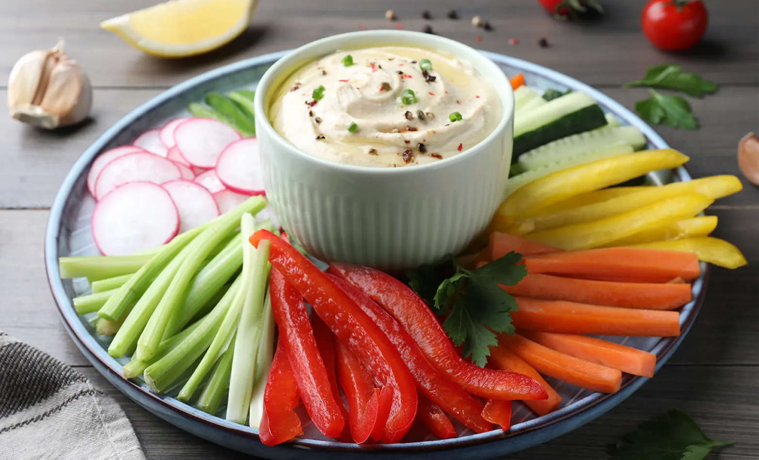 whipped feta dip with a plate of veggies