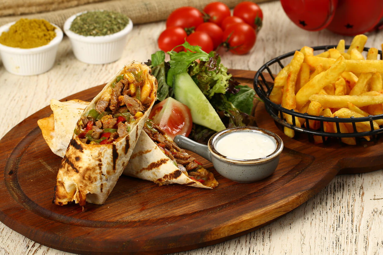 Turkey burritos on a plate.