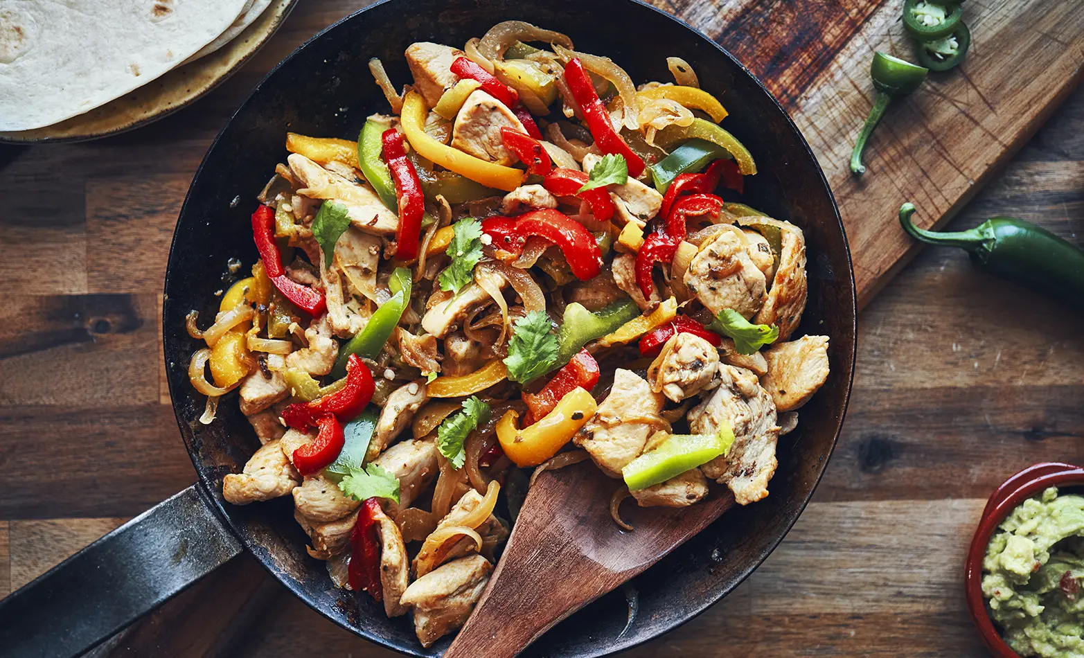 Chicken and veggie fajitas in a skillet