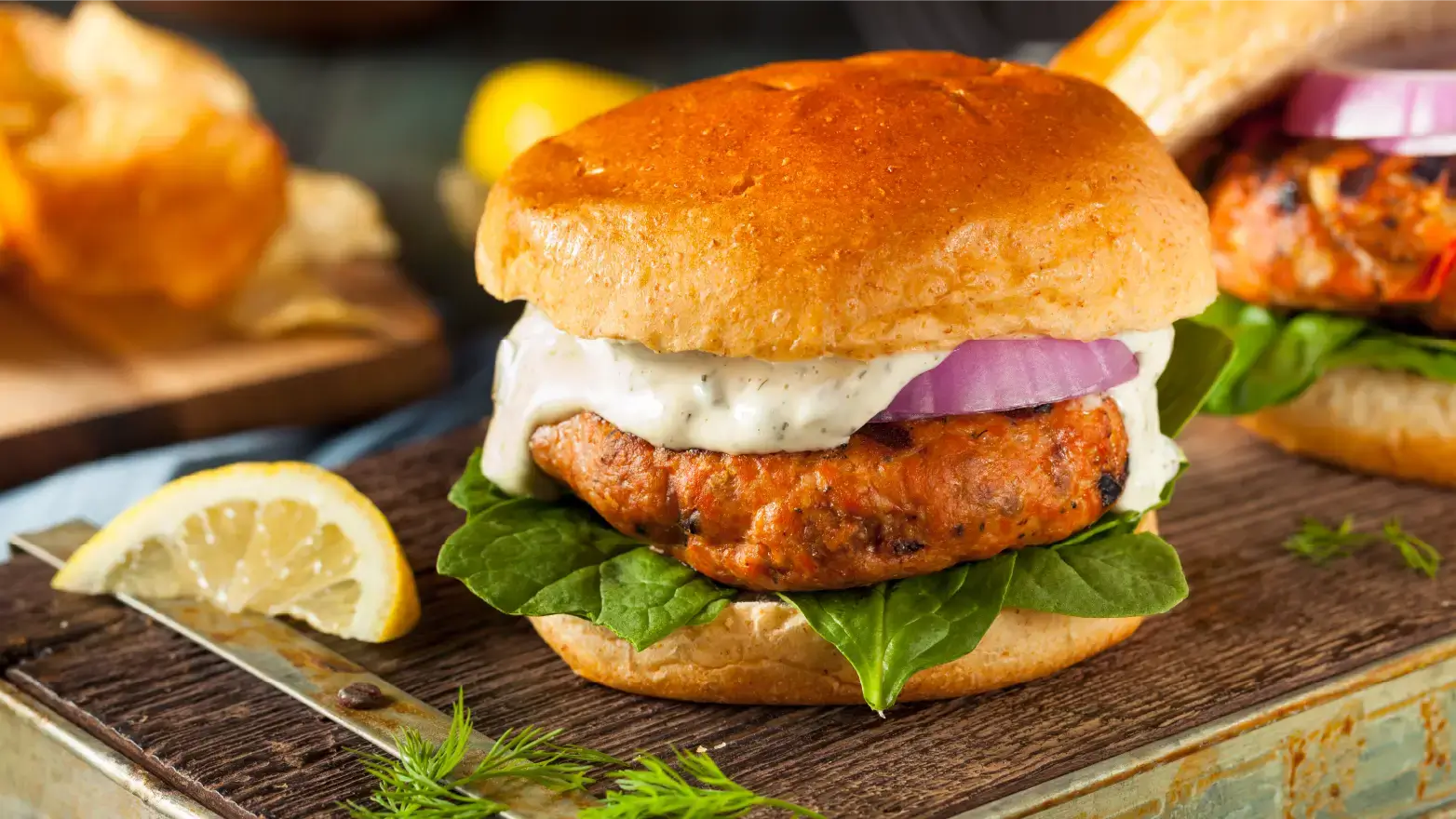 lemon yogurt salmon burgers with onion and lettuce
