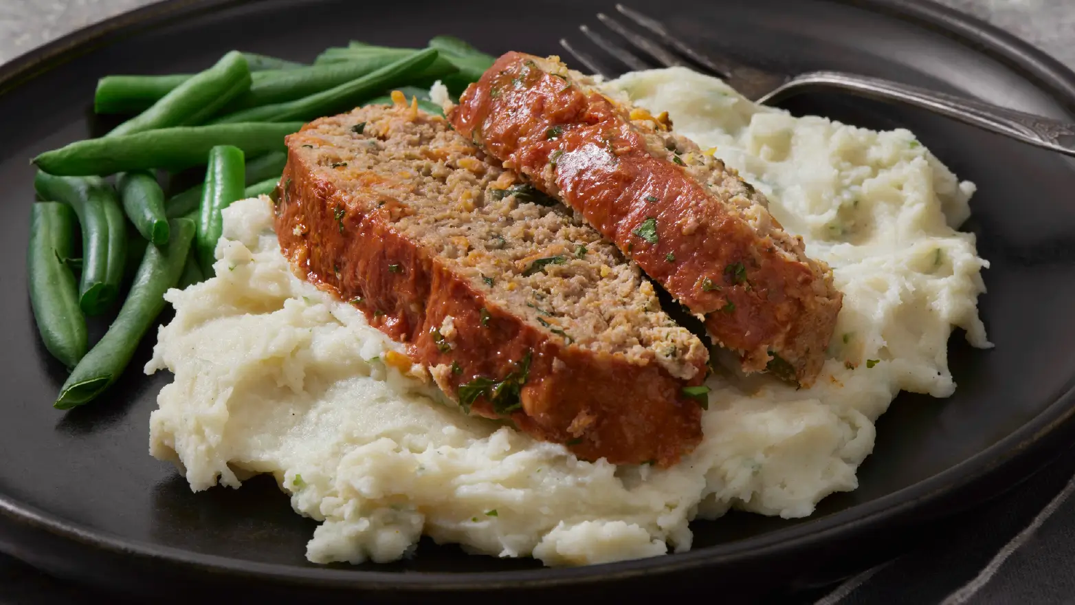 Stock image of meatloaf and mashed potatoes
