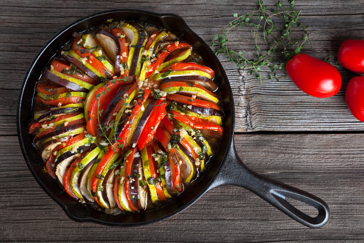 Vegetable ratatouille baked in cast iron frying pan traditional homemade