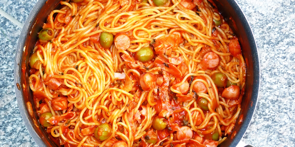 One pot pasta cooking on stove.