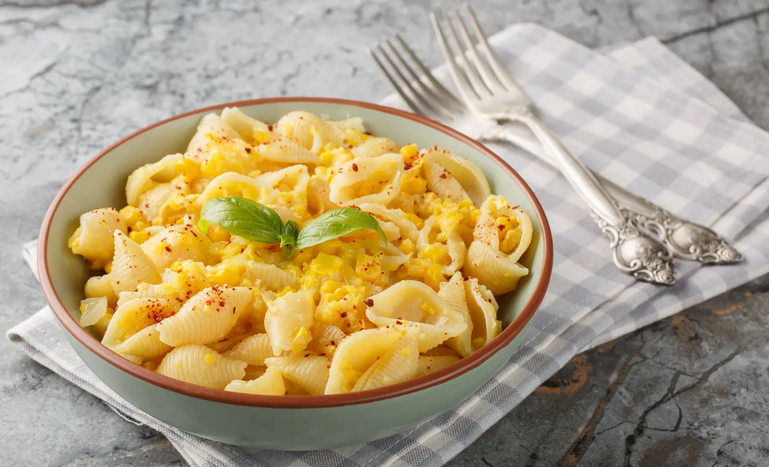 A bowl of sweet corn and scallop pasta