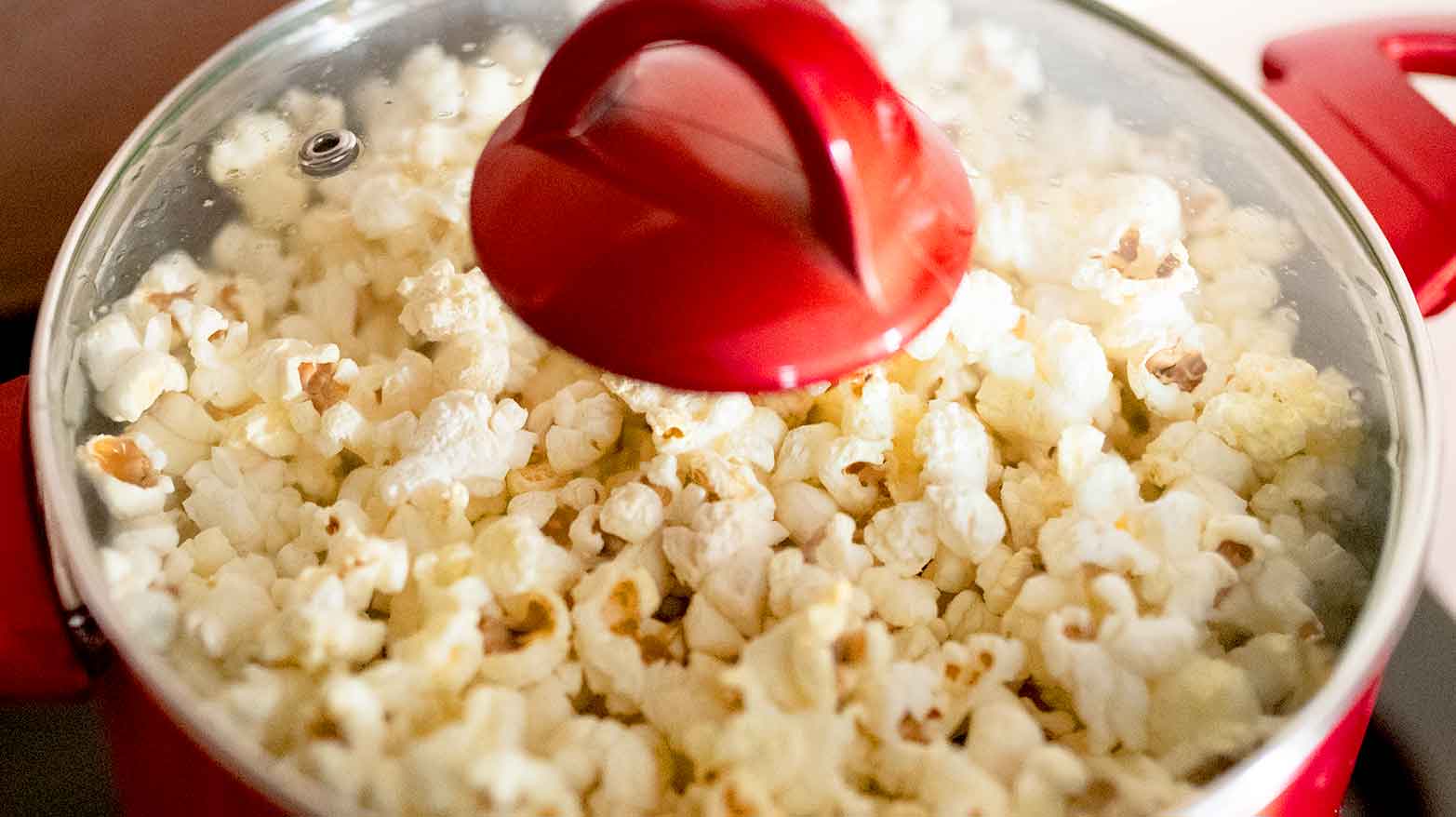The “pop” in popcorn is due to water/steam escaping.