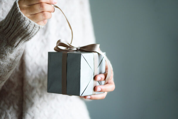 woman opening a gift