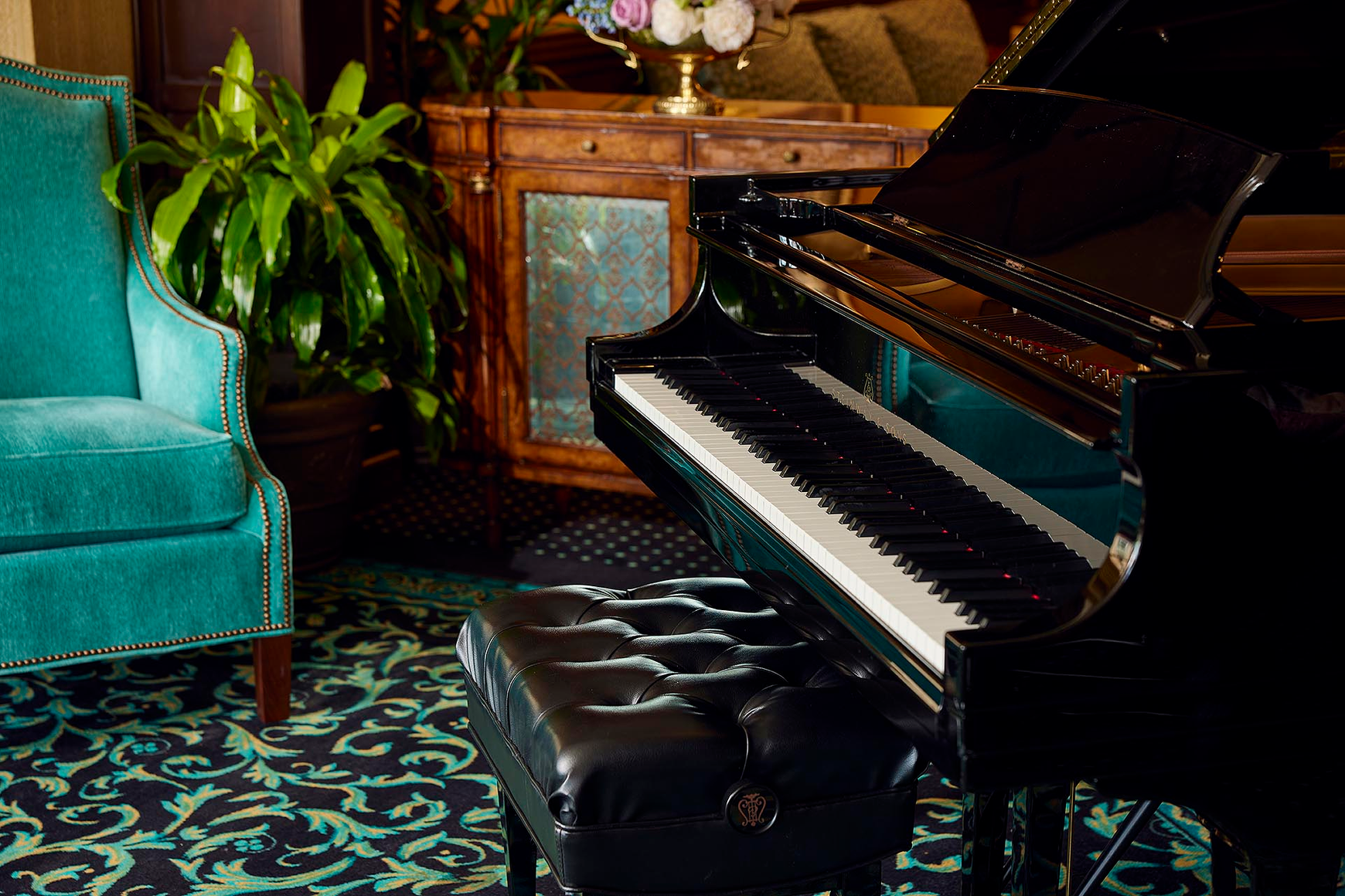 A spot to gather in the lobby to play show tunes on the baby grand