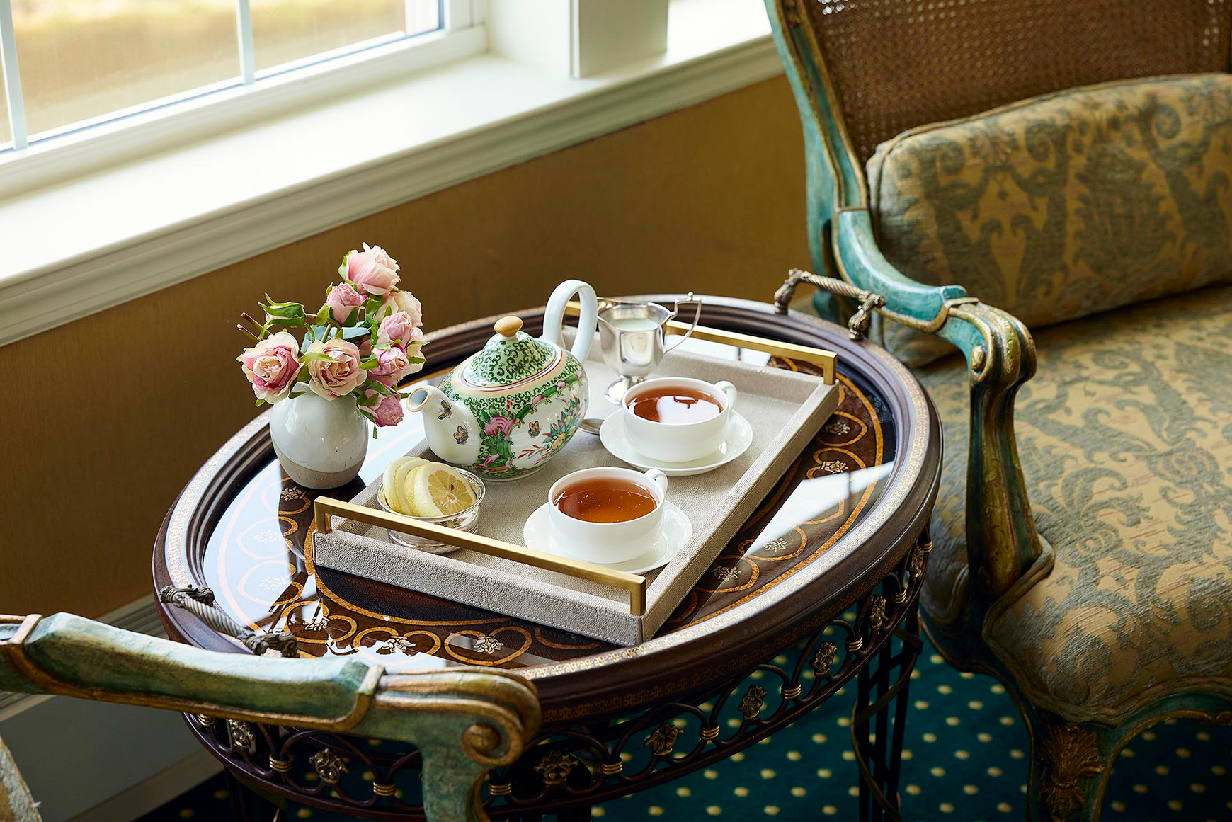Afternoon tea with beautiful china and fresh flowers