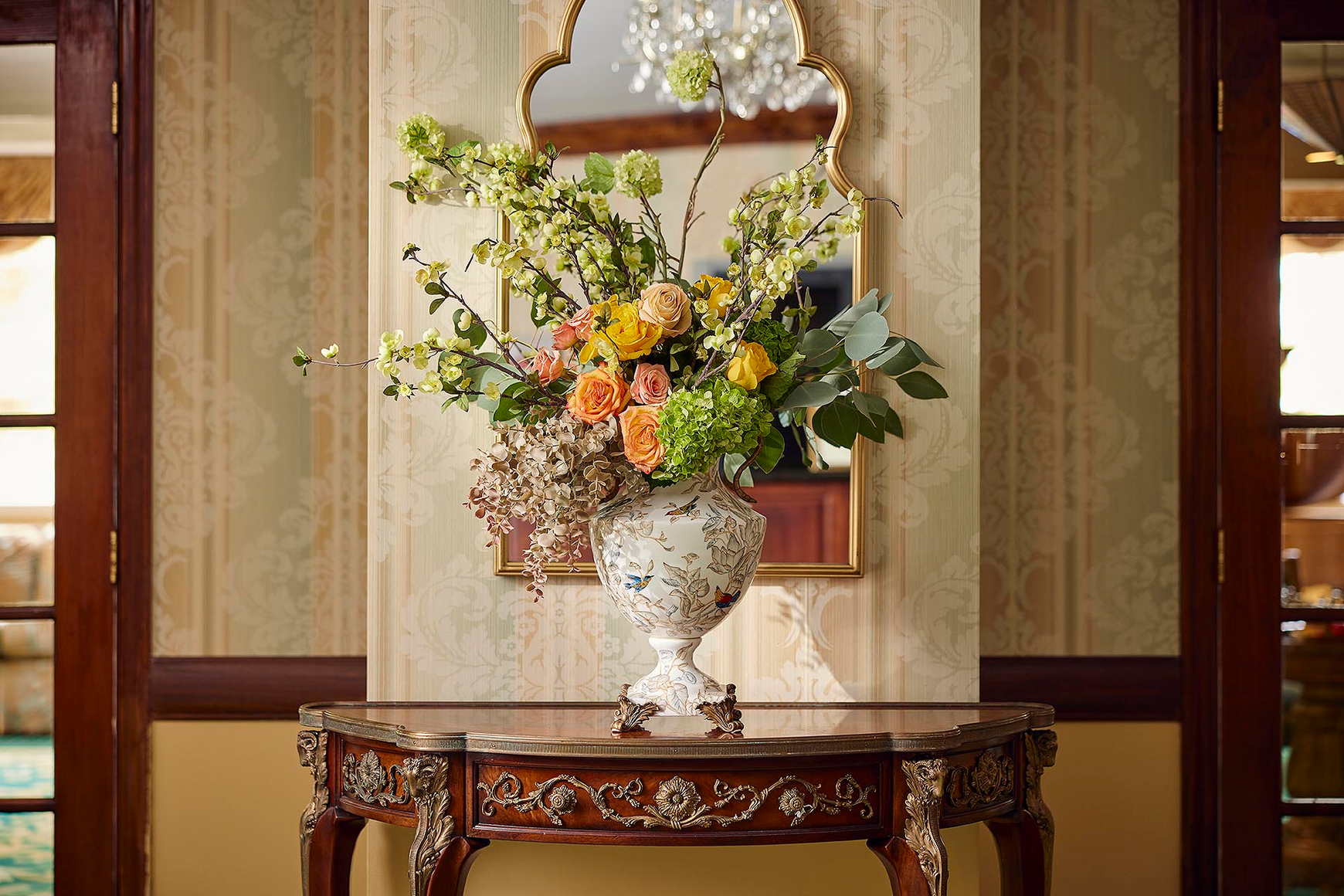 Roses and hydrangeas in a large vase