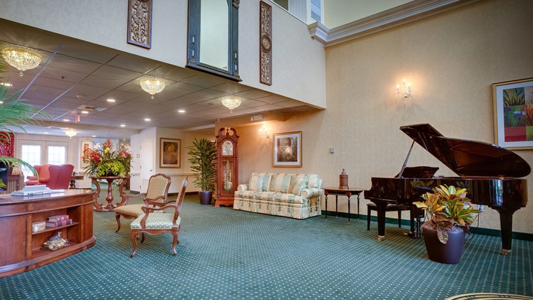 Foyer with a couch and chairs