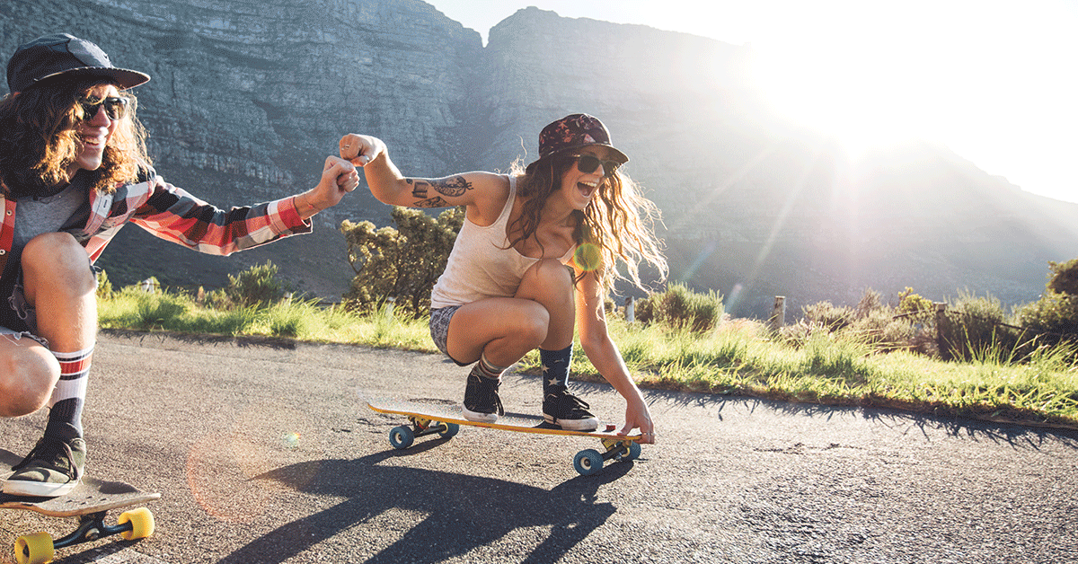 Two girls skateboarding