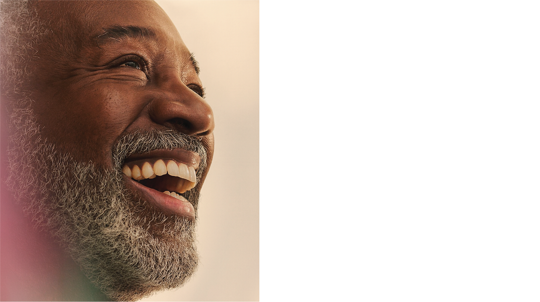 Two people doing yoga on the beach