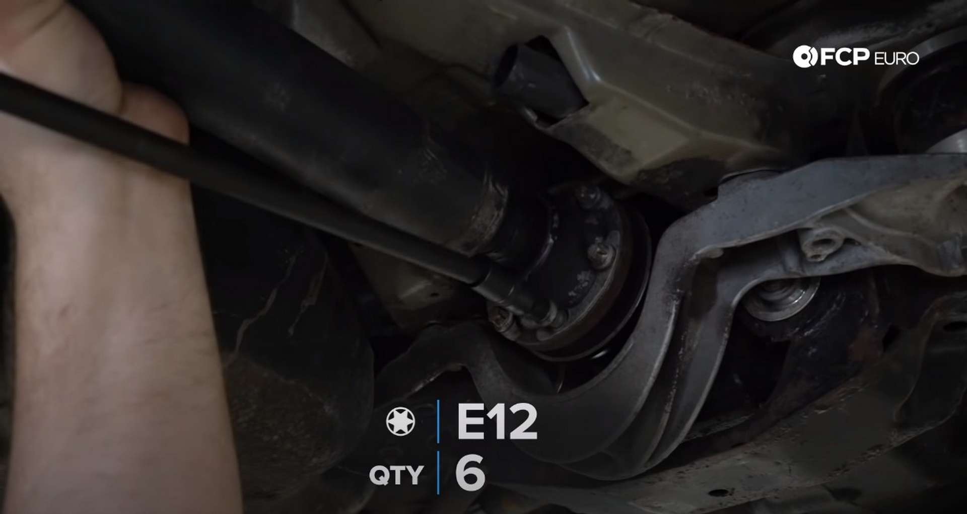 DIY BMW E46 Clutch Replacement removing the driveshaft bolts