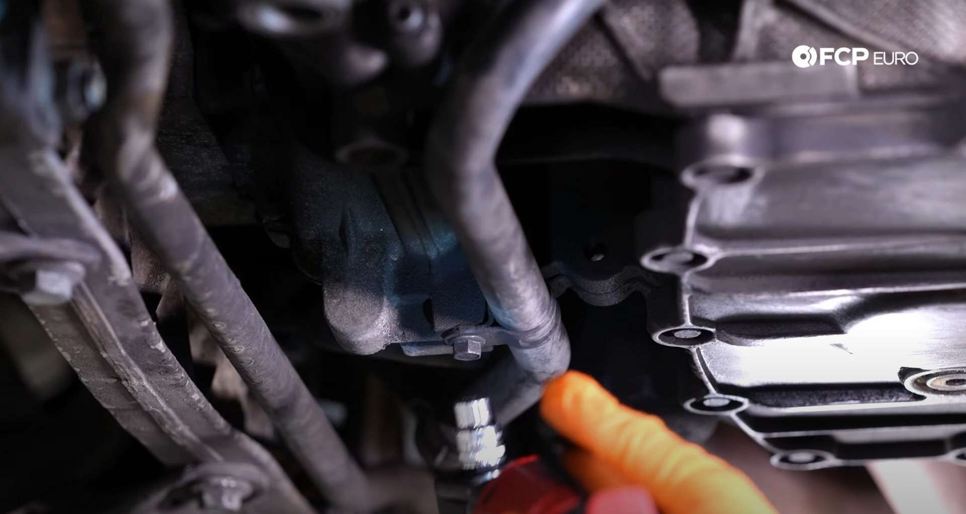DIY Porsche 996 911 Water Pump And Thermostat Replacement coolant pipe rear mounting bolt