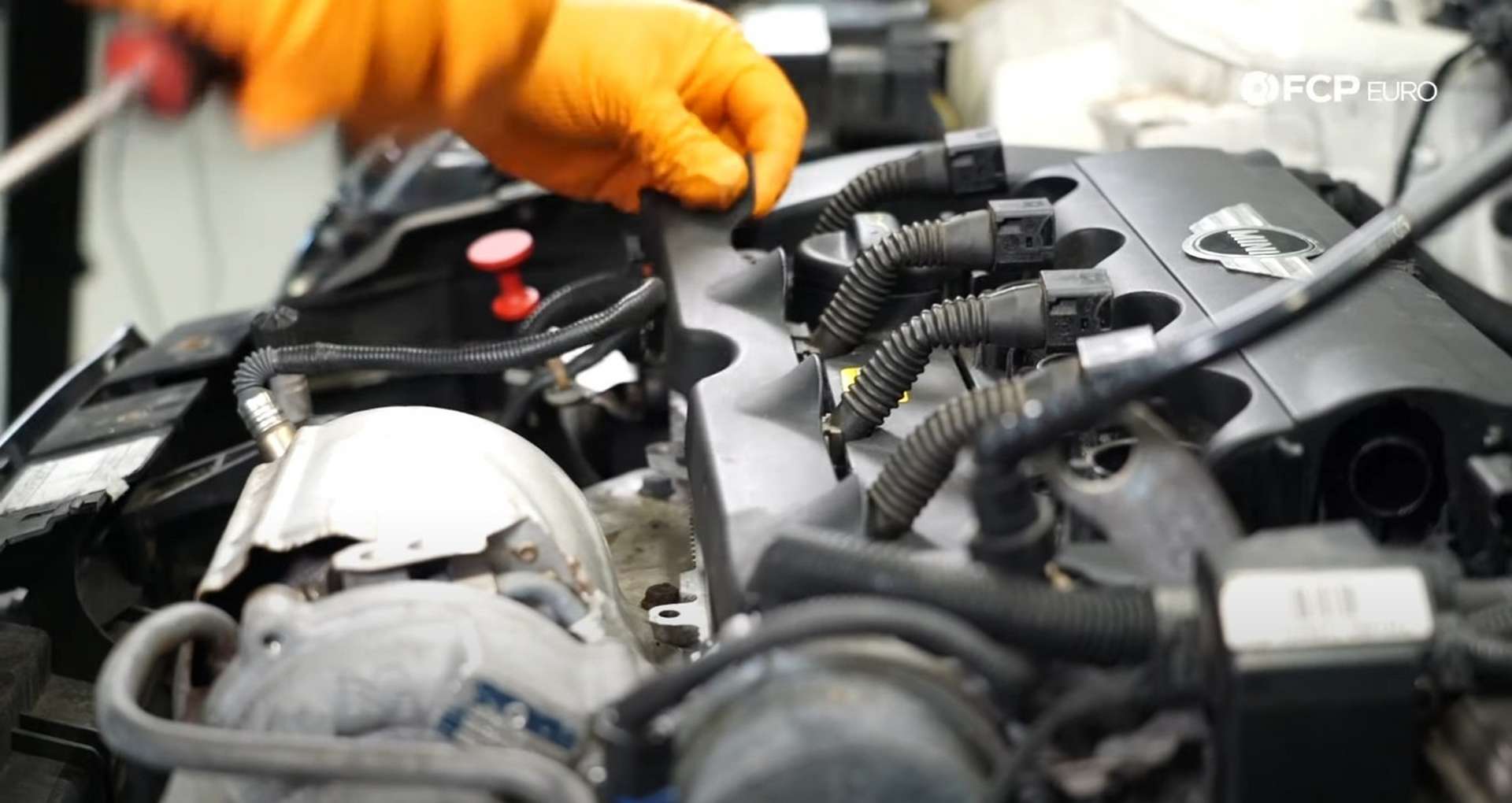 DIY MINI R56 Timing Chain Replacement removing the ignition harness cover