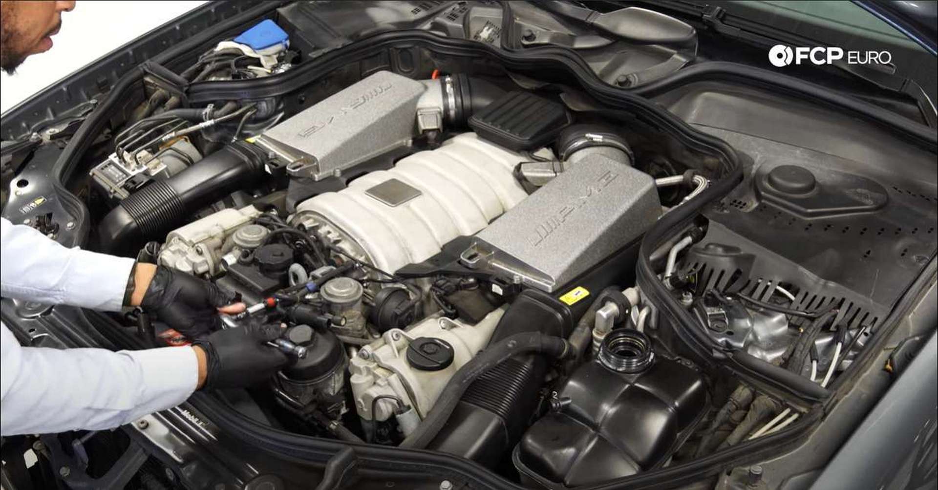 M156 Thermostat Replacement removing reservoir mounting bolt