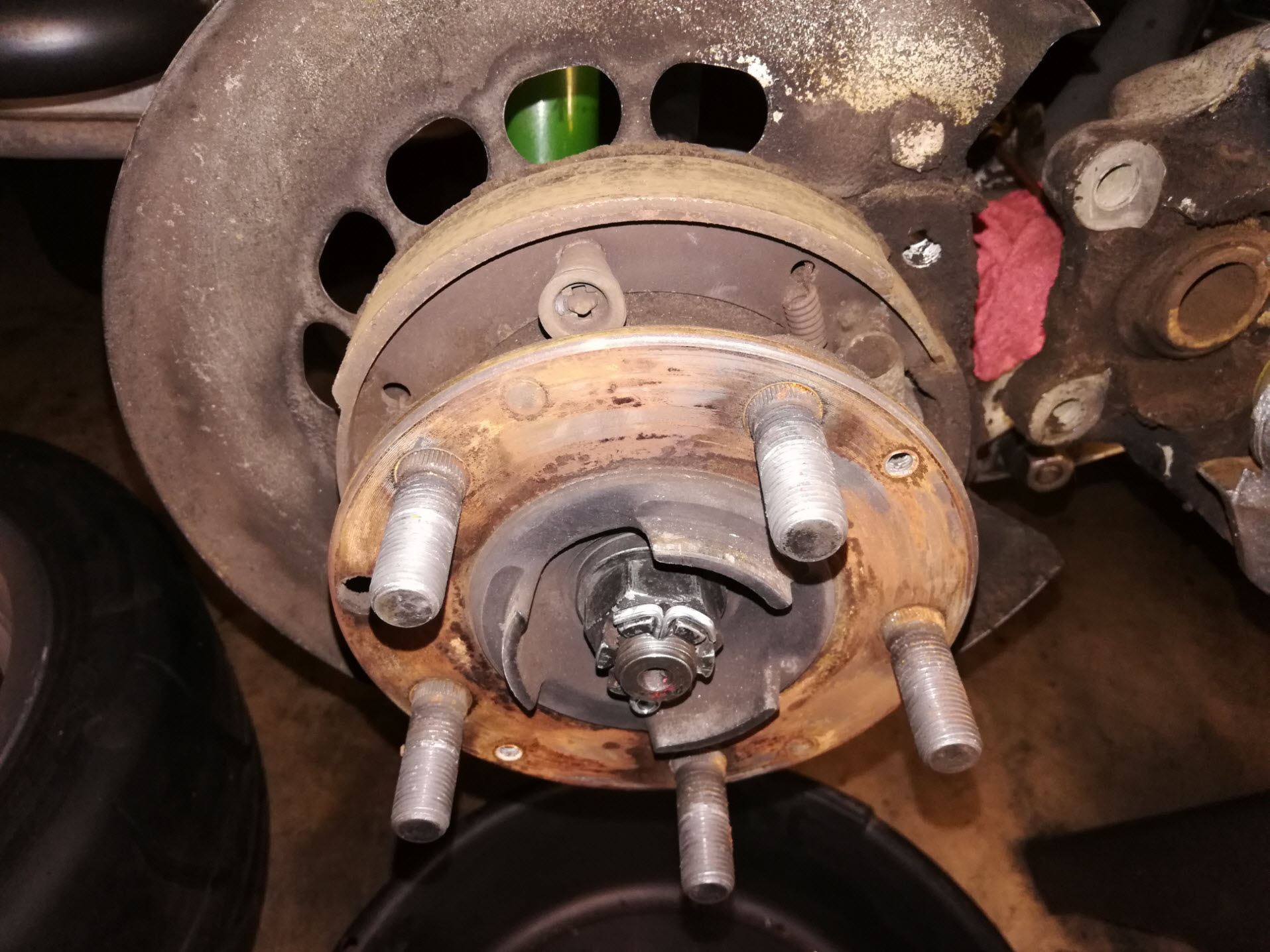 Air-cooled Porsche 911 rear parking brake assembly.