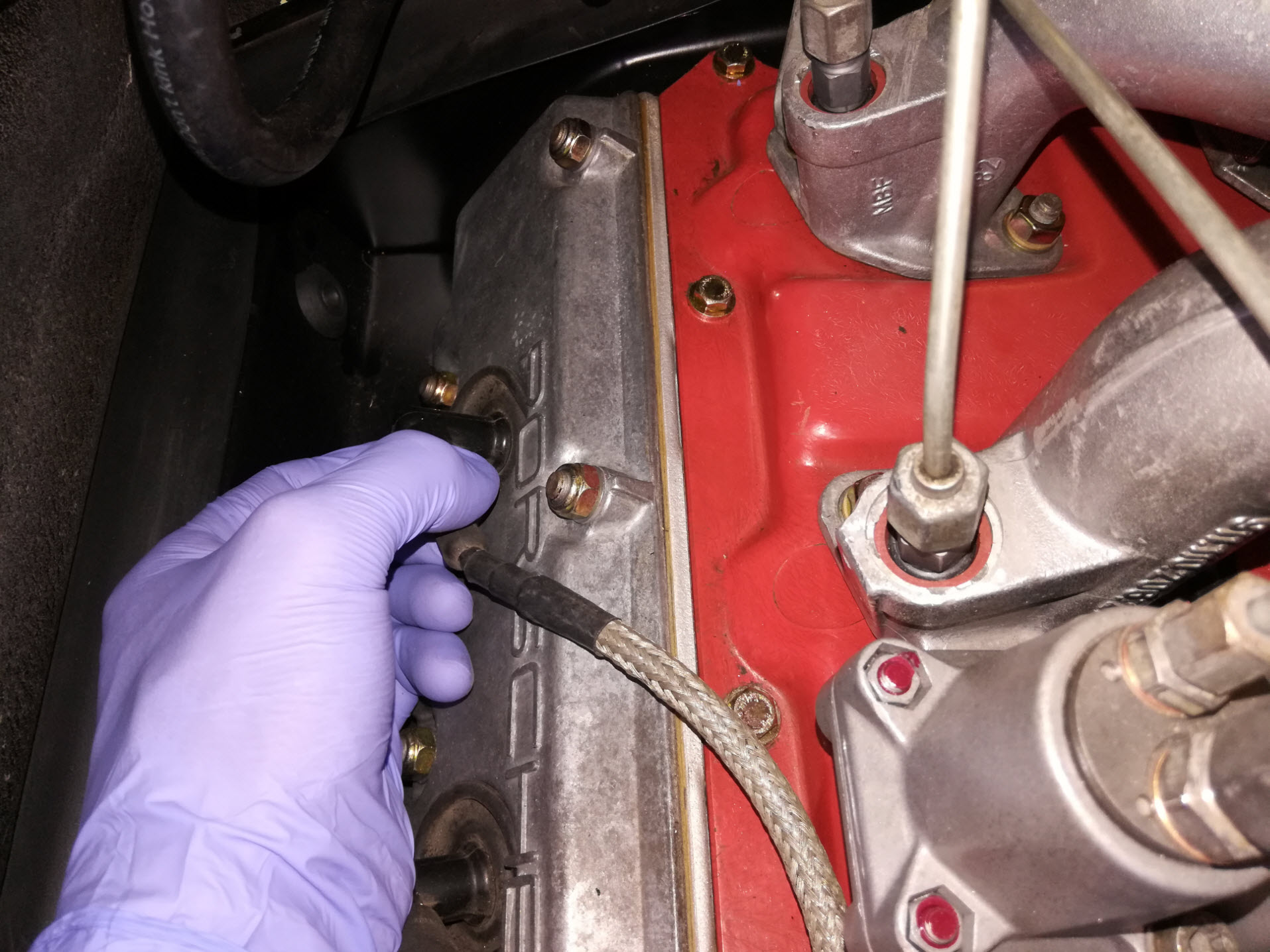 Air-cooled Porsche 911 spark plug wire removal.