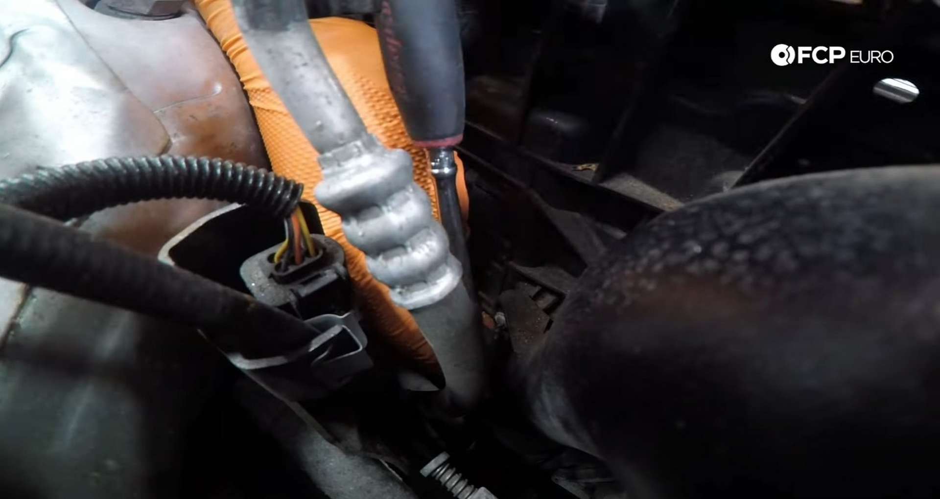 DIY MINI R56 Timing Chain Replacement removing the charge pipe mounting bolt