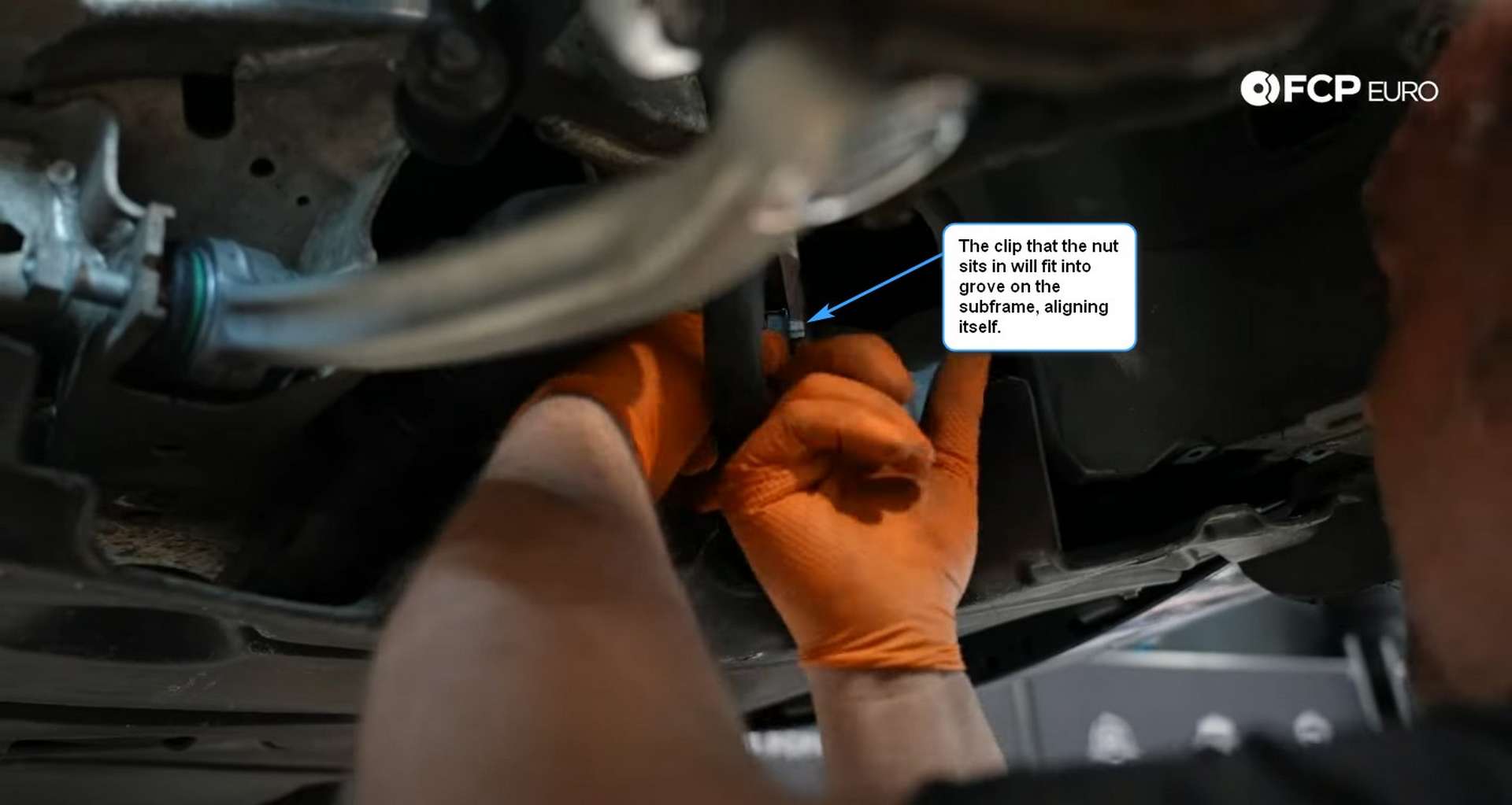 DIY BMW E9X Front Control Arm Upgrade installing the tension rod’s new inner nut