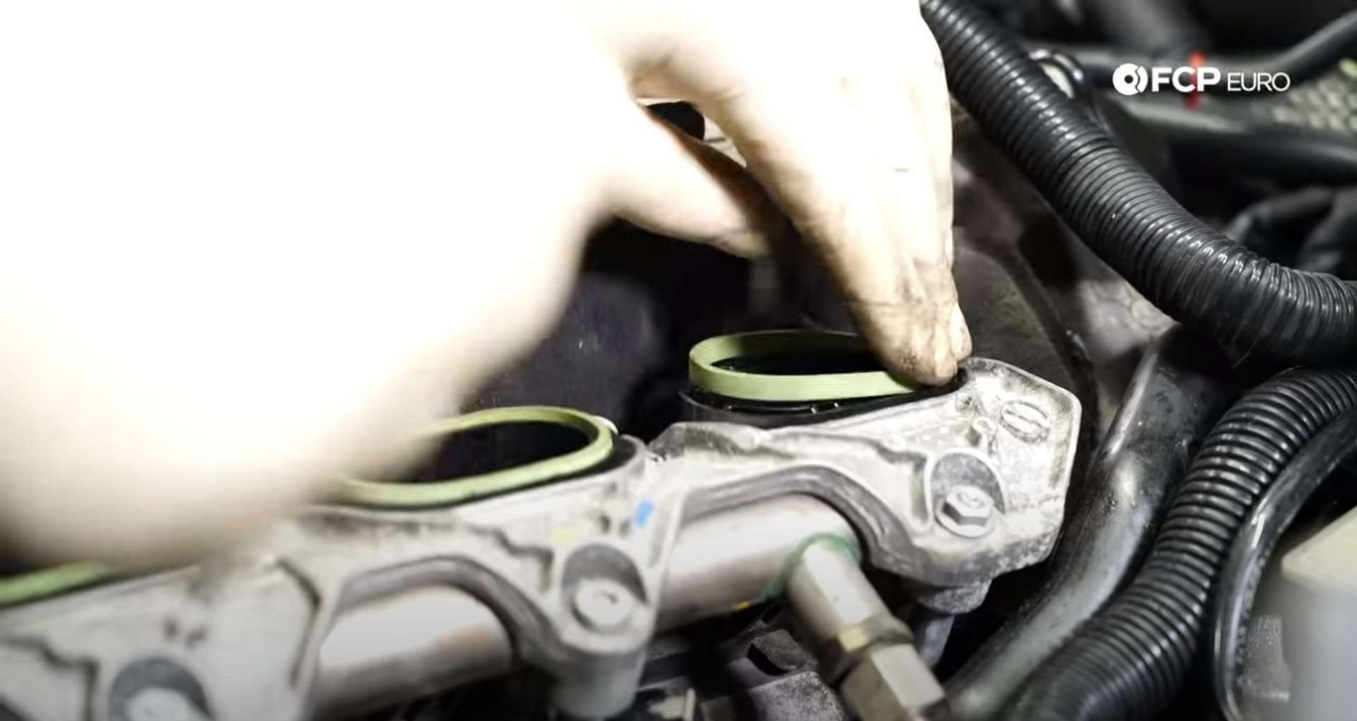 DIY Audi 3.0T Supercharger Oil Change installing the new supercharger gaskets