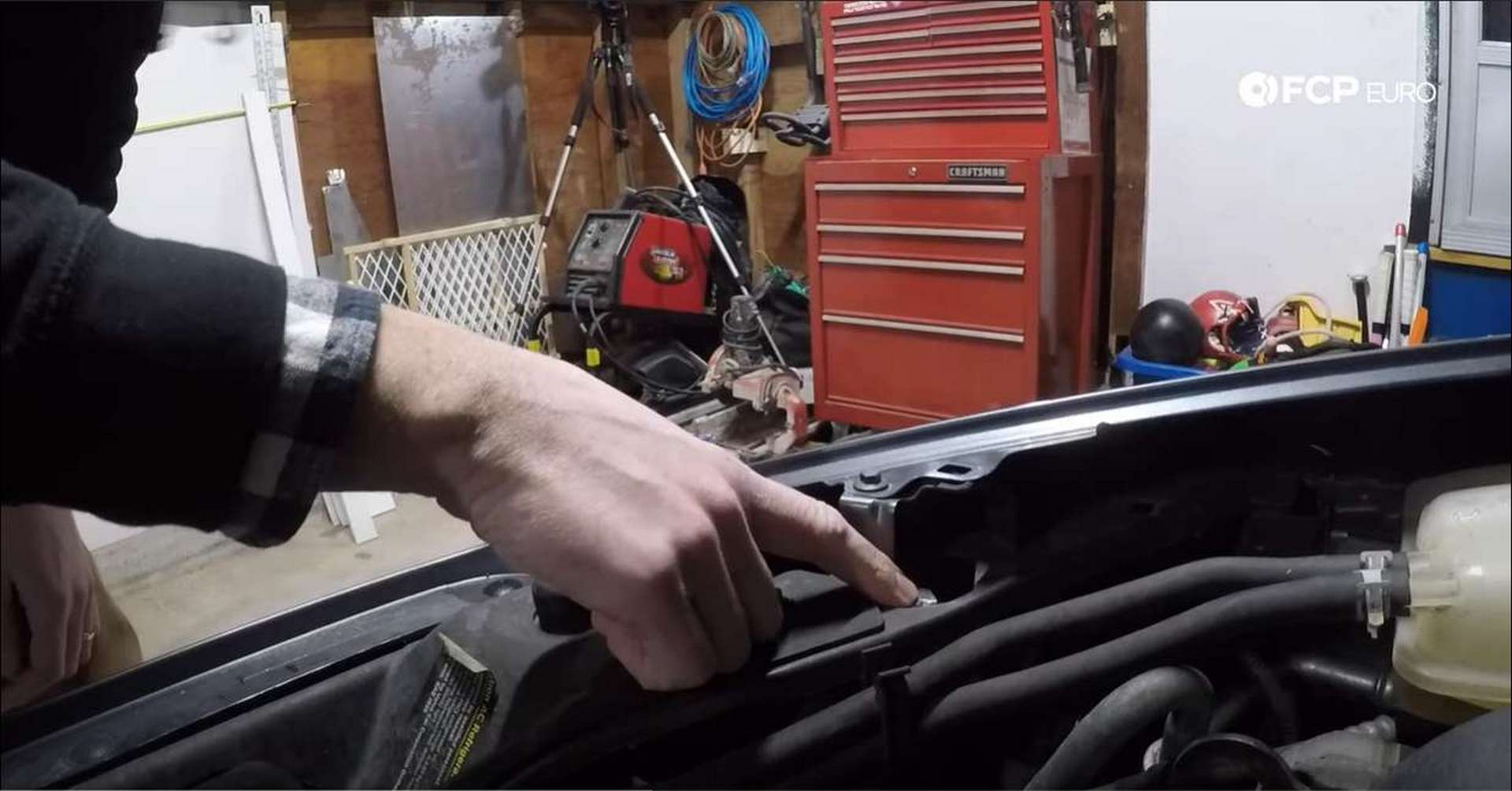 Volvo Headlight Replacement tab location