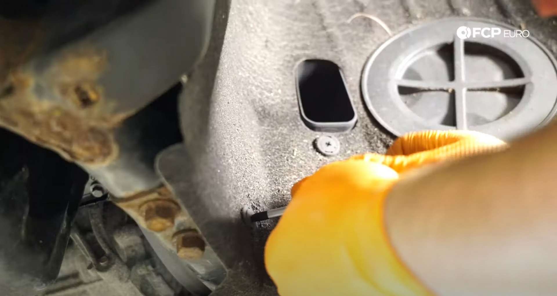 DIY MINI R56 Timing Chain Replacement removing the fender liner fasteners