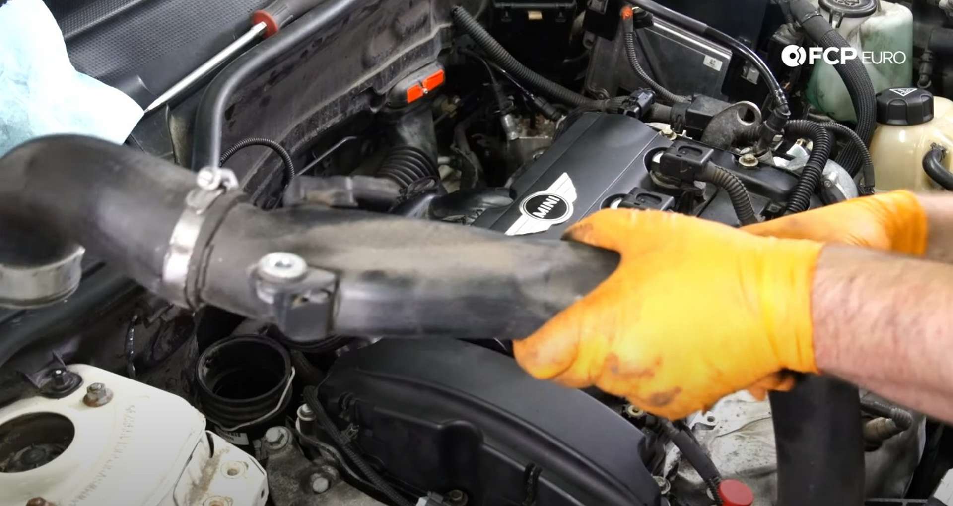 DIY MINI R56 Timing Chain Replacement reinstalling the charge pipe