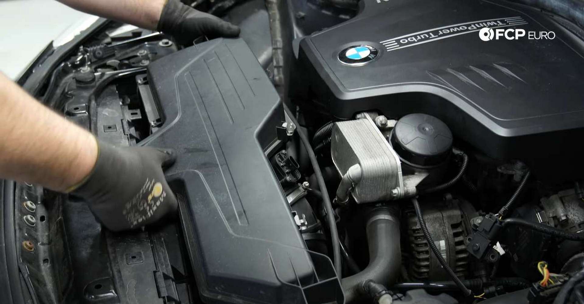 DIY BMW F30 Serpentine Belt Replacement pulling out the airbox