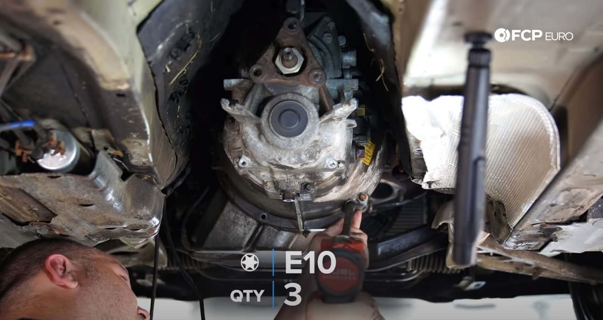 DIY BMW E46 Clutch Replacement removing the bell housing bolts